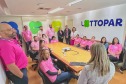 Ações do Paraná Rosa mobilizam servidores da Lottopar em uma parceria com a Secretaria da Saúde.